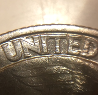 1987-P-Quarter-With-Reverse-Error-With-Connecting-Nit-In-United.
