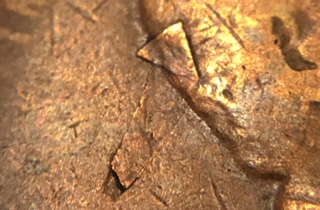 1919-S-Lincoln-Cent-With-A-Fold-Over-Lamination-On-Lincoln'-Head.