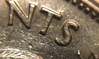 1968-Canadian-Nickel.-Doubling-On-The-Reverse.-Over-Abrated-Die?