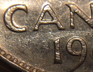 1968-Canadian-Nickel.-Doubling-On-The-Reverse.-Over-Abrated-Die?
