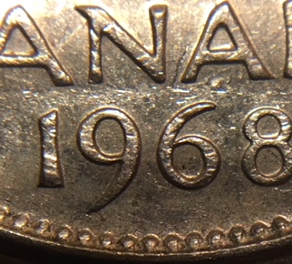1968-Canadian-Nickel.-Doubling-On-The-Reverse.-Over-Abrated-Die?