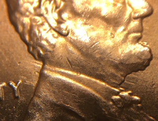 2011-D-LSC-Feeder-Finger-Damage-On-The-Obverse.