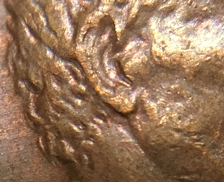 1974-D-LMC-Question-Concerning-The-Back-Of-The-Head-And-Ear