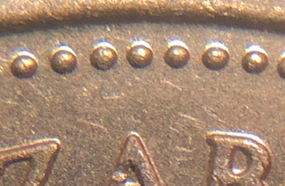 1980-Near-Or-Far-Beaded-Canadian-Quarter?