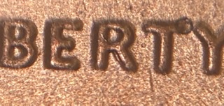 2020-D-LSC-With-An-Anomaly-With-The-Right-Leg-Of-The-Letter-R-In-Liberty