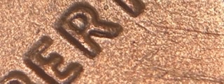 2020-D-LSC-With-An-Anomaly-With-The-Right-Leg-Of-The-Letter-R-In-Liberty