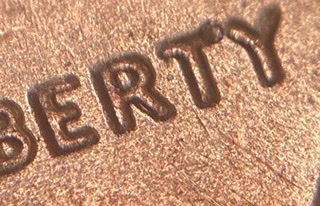 2020-D-LSC-With-An-Anomaly-With-The-Right-Leg-Of-The-Letter-R-In-Liberty