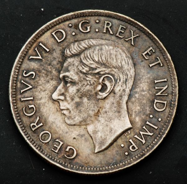 1939-1-Dollar-Coin.-Grading-Please.