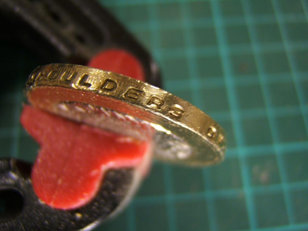 Is-There-A-Competition-For-The-Worst-Fake-�2-Coin-?.