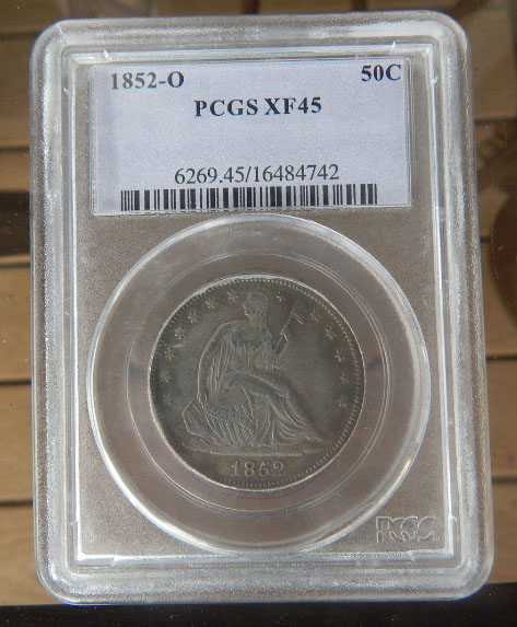 Fake-1852-O-Seated-Half