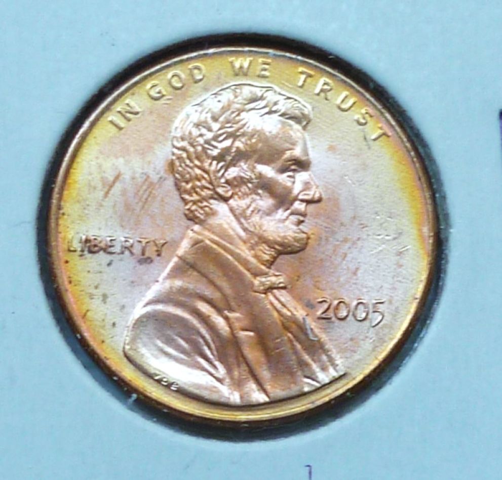 At-Vs-Nt-On-Coins-And-Medals