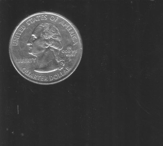 Rust-Quarter-Coin-With-Some-T-Missing