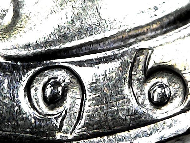 Raised-Lines-Connecting-The-Date-In-A-1966-Liberty-Quarter