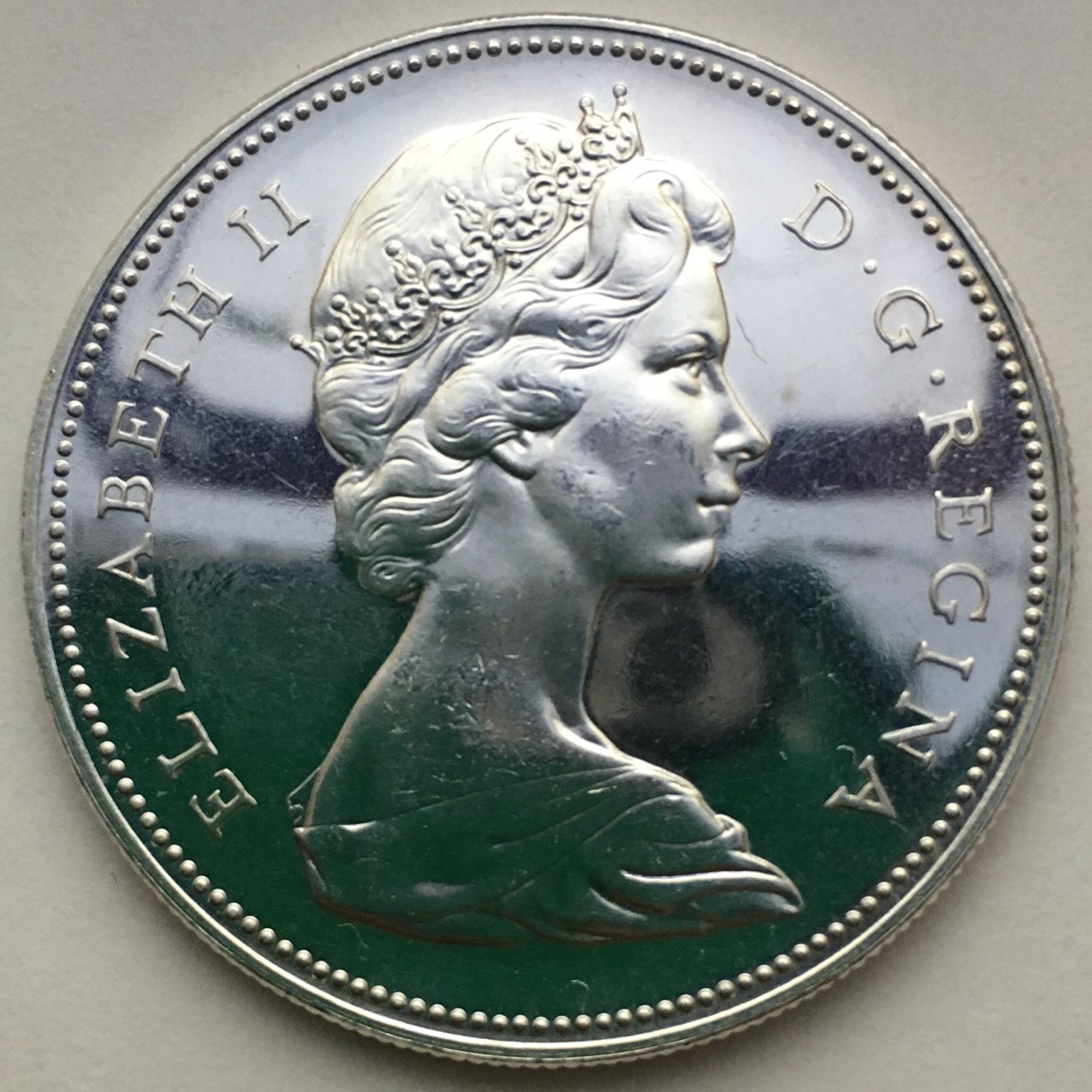 Grading-Opinions-On-This-1966-Large-Bead-Silver-Dollar-DDO-Under-Debate