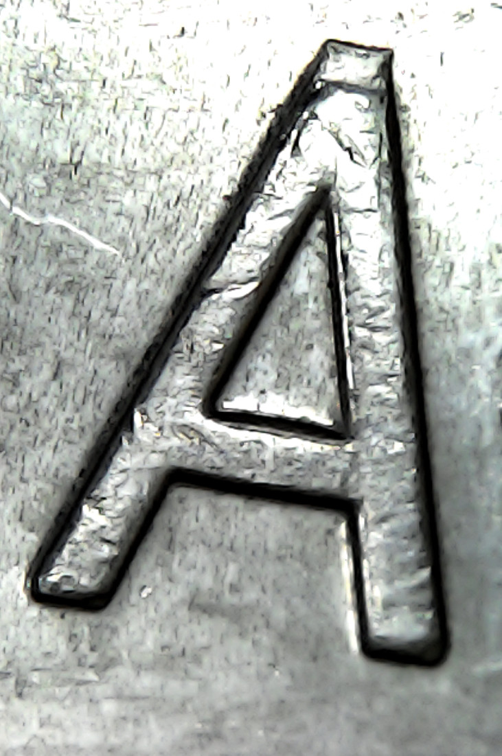 2016-Toonie-With-Doubling-Of-Some-Sort-On-Obverse,-Opinions-Appreciated.