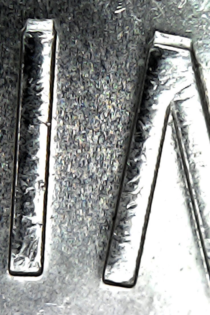 2016-Toonie-With-Doubling-Of-Some-Sort-On-Obverse,-Opinions-Appreciated.