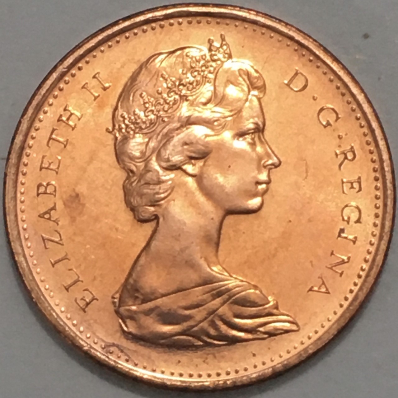 1967-Uncirculated-1-Cent,-Struck-Through-String/Thread-On-Obverse
