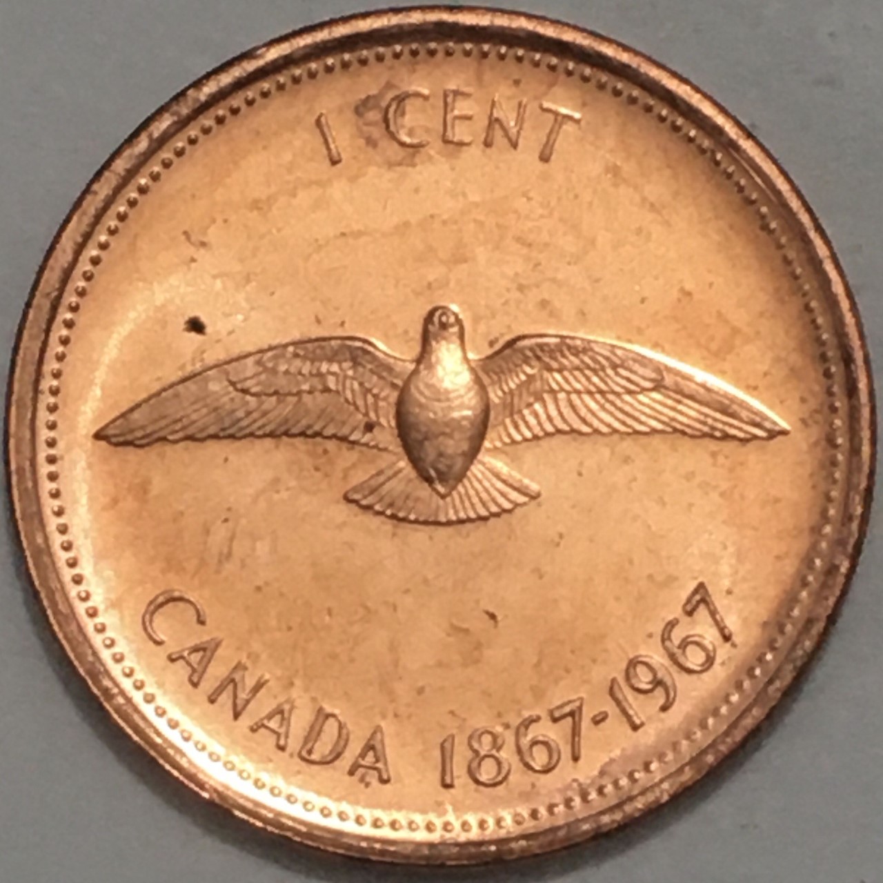 1967-Uncirculated-1-Cent,-Struck-Through-String/Thread-On-Obverse
