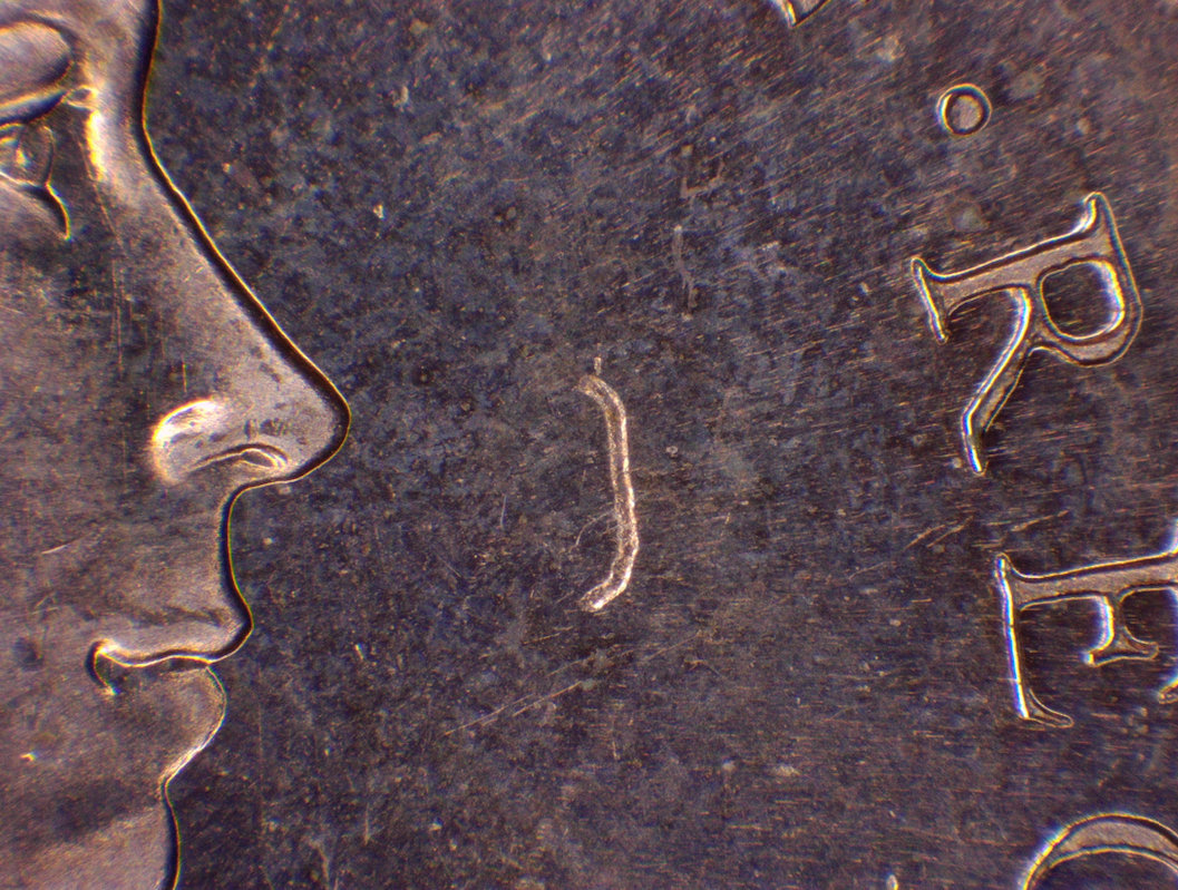 1967-Uncirculated-1-Cent,-Struck-Through-String/Thread-On-Obverse