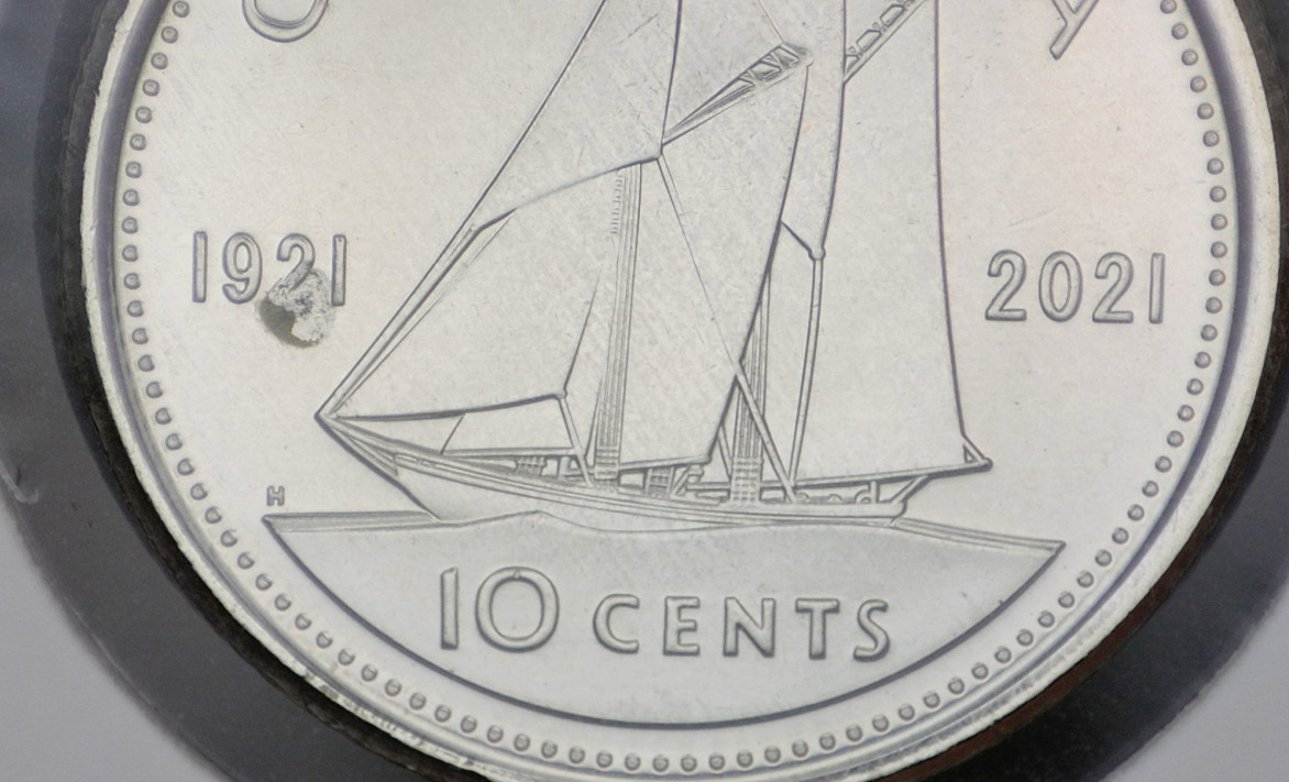 2021-Dual-Dated-Dime,-Struck-Through-Retained-Grease