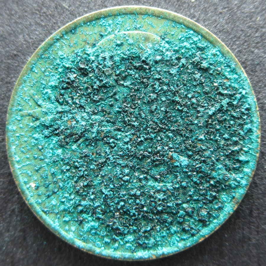Switzerland-2-Rappen-1963-With-A-Minor-Case-Of-Bronze-Disease.