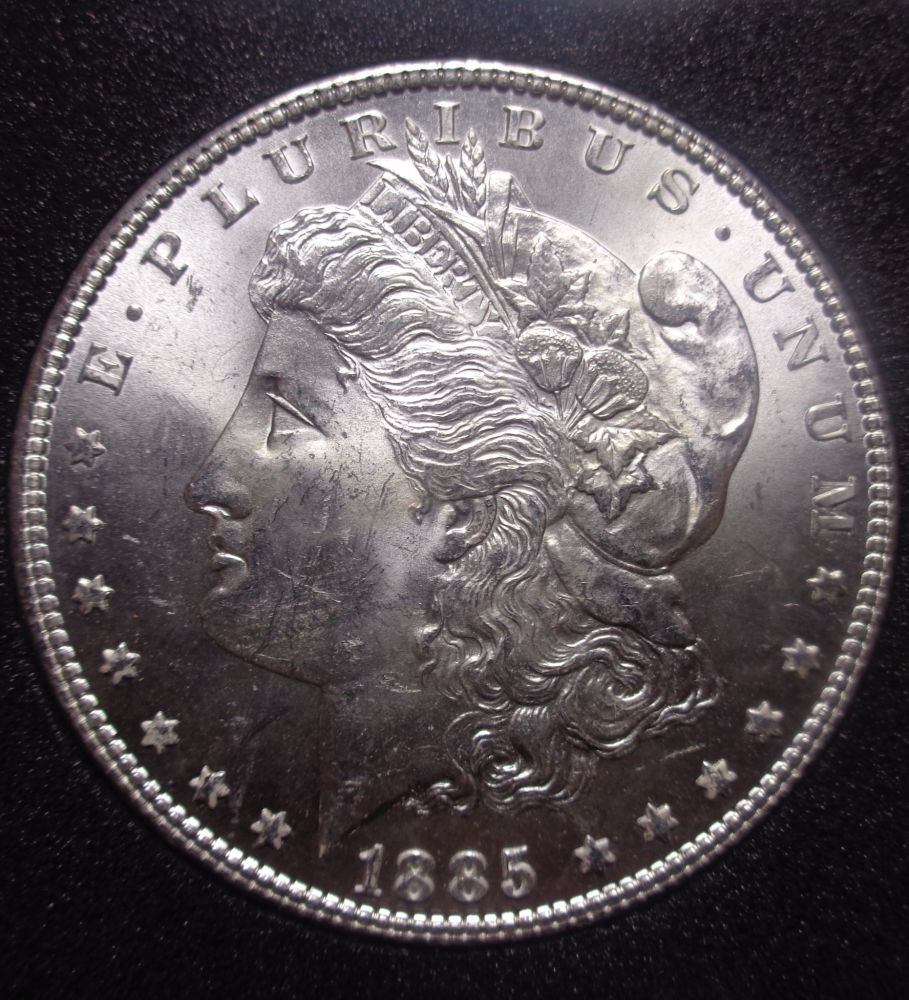 1885-Morgan-Dollar.-Grade.