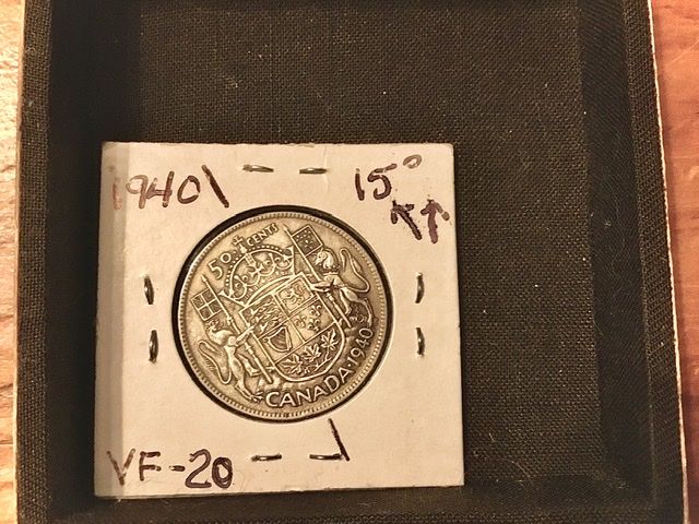 1940-50-Cent.-Off-Set-Die,-About-15-Deg.-Check-It-Out.