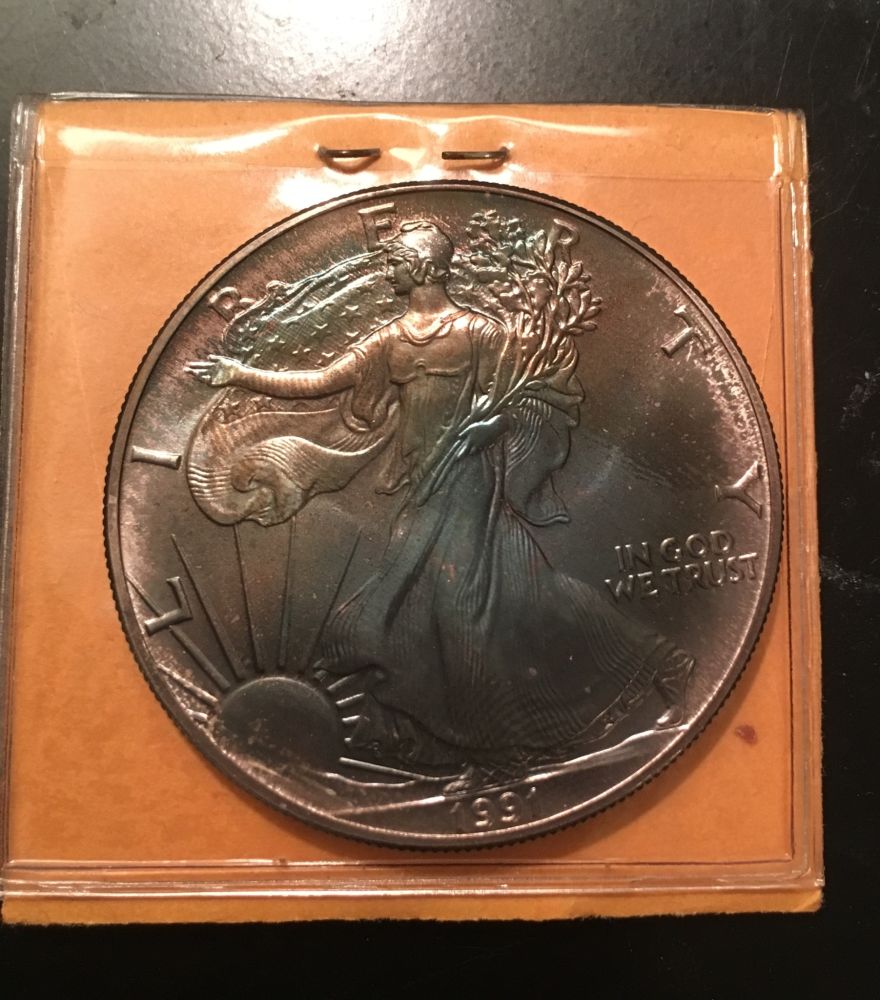 1991-Discolored-Silver-Dollar