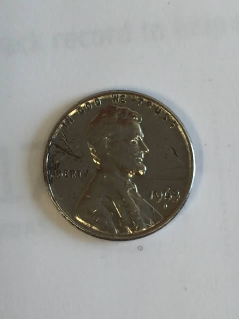 1963-D-Silver-Colored-Penny,-Stripped?