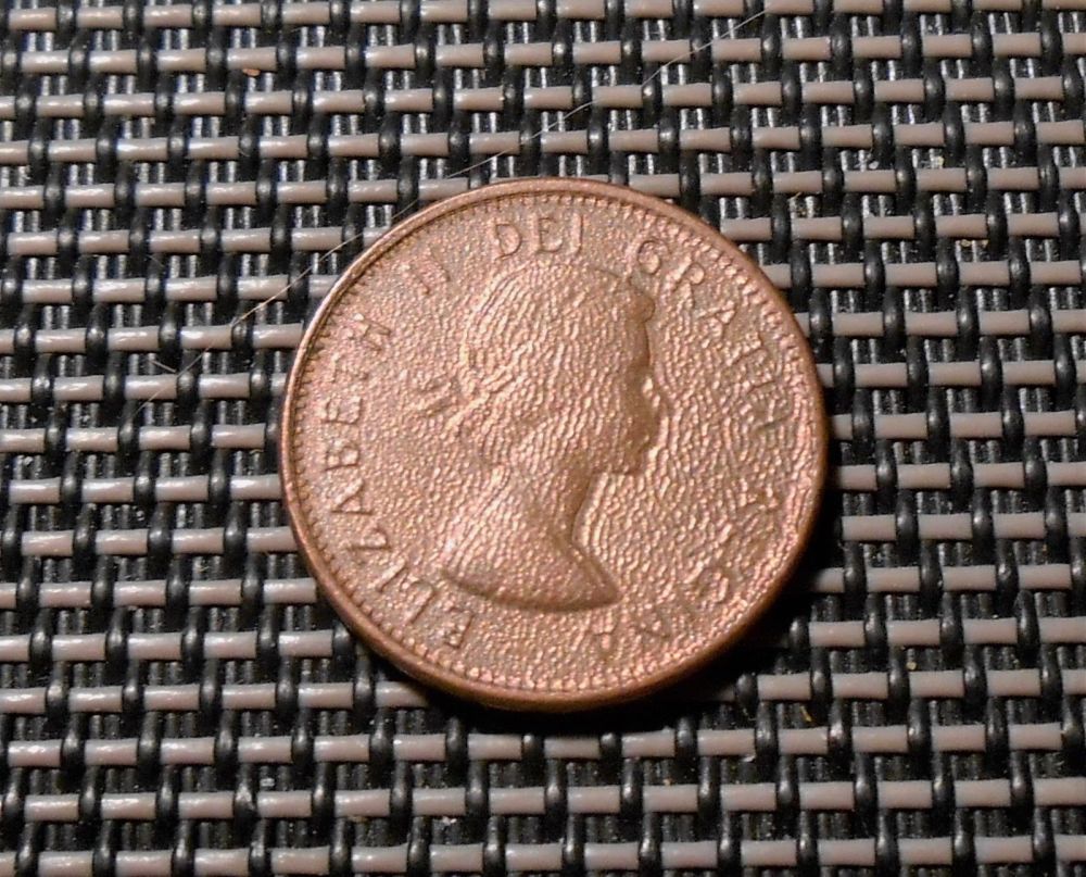 Struck-Through-Grease-61-Penny-Counterfeit?