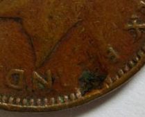 1943-Newfoundland-Penny---Error-Or-PMD?