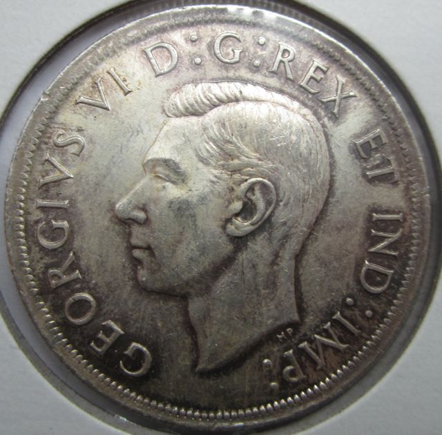 Silver-Dollar-Cameo-Question-39-And-65
