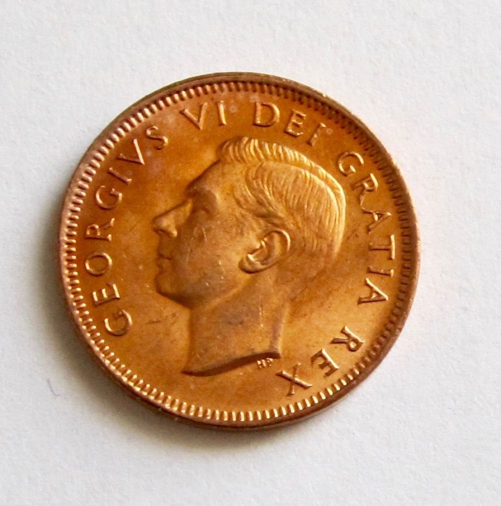 1949-Penny.-'A'-Points-To-Denticle?
