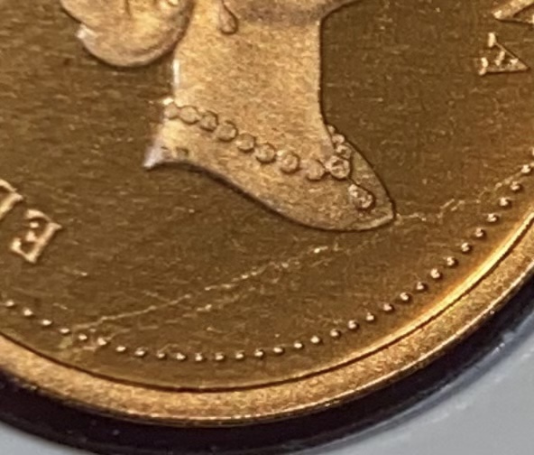 Lamination-Error-On-Canada-1-Cent-Proof-Coin.
