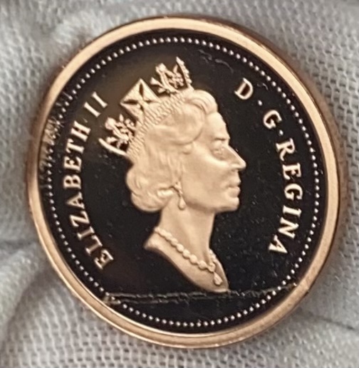 Lamination-Error-On-Canada-1-Cent-Proof-Coin.