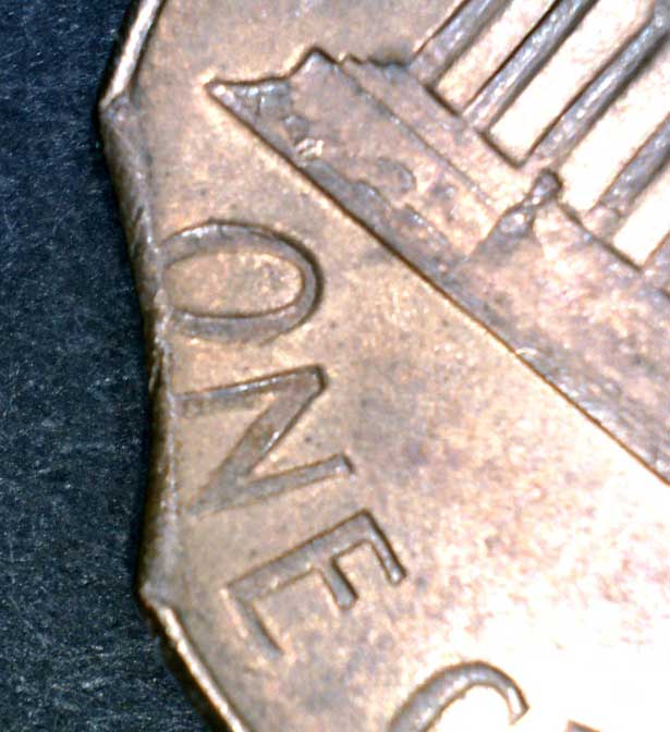 Clipped-Penny-Planchet----Mint-Damage-Or-Circulation-Damage?