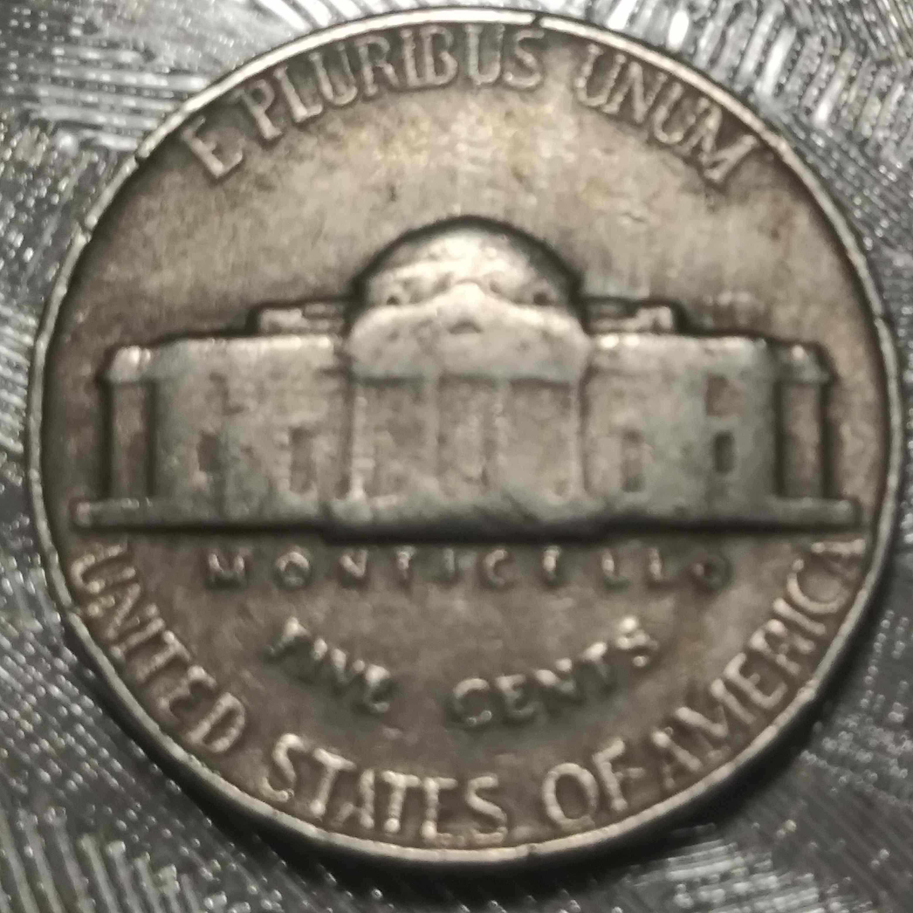 1954-Jefferson-Nickel-With-An-Extra-Letter?--Above-The-P-On-Reverse