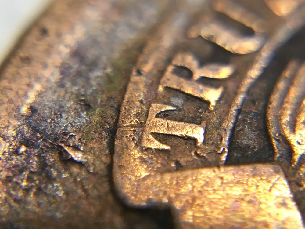 Slightly-Off-Center-2-Cent-Piece