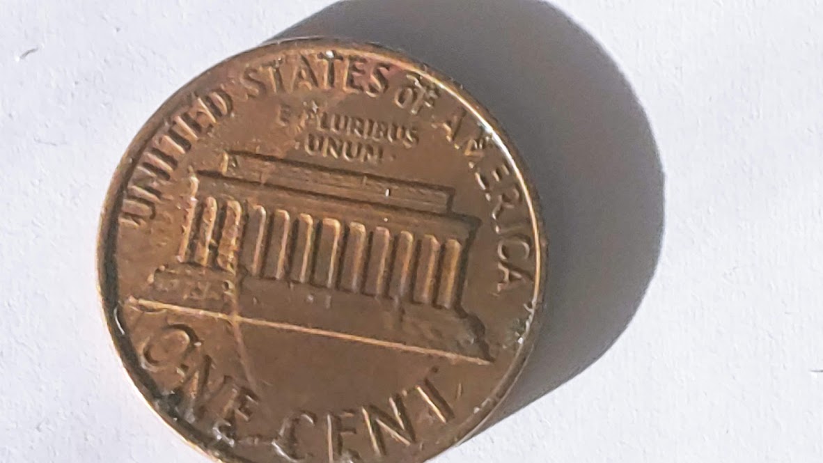 1977-Penny-Looks-Double-Stamped
