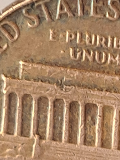 1981-D-Penny-Reverse-Shows-Some-Kind-Of-Impression-On-The-Monument-On-The--Top-Left