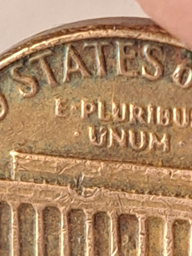 1981-D-Penny-Reverse-Shows-Some-Kind-Of-Impression-On-The-Monument-On-The--Top-Left