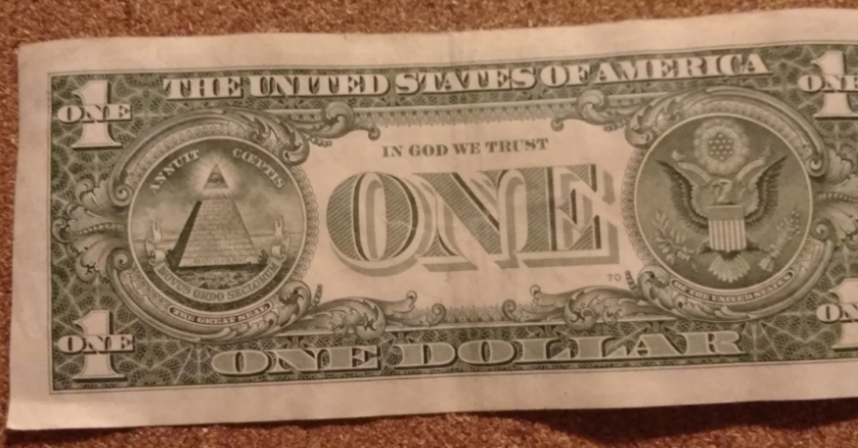 2013-Dollar-Bill-Looks-Like-Thread-Is-Through-Face