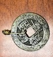 Asian-Coin-With-Square-Cut-Out-Of-Center-Id:-Chinese-Ch'ing-Dynasty.-Emperor:-Kao-Tsung-1736-1795
