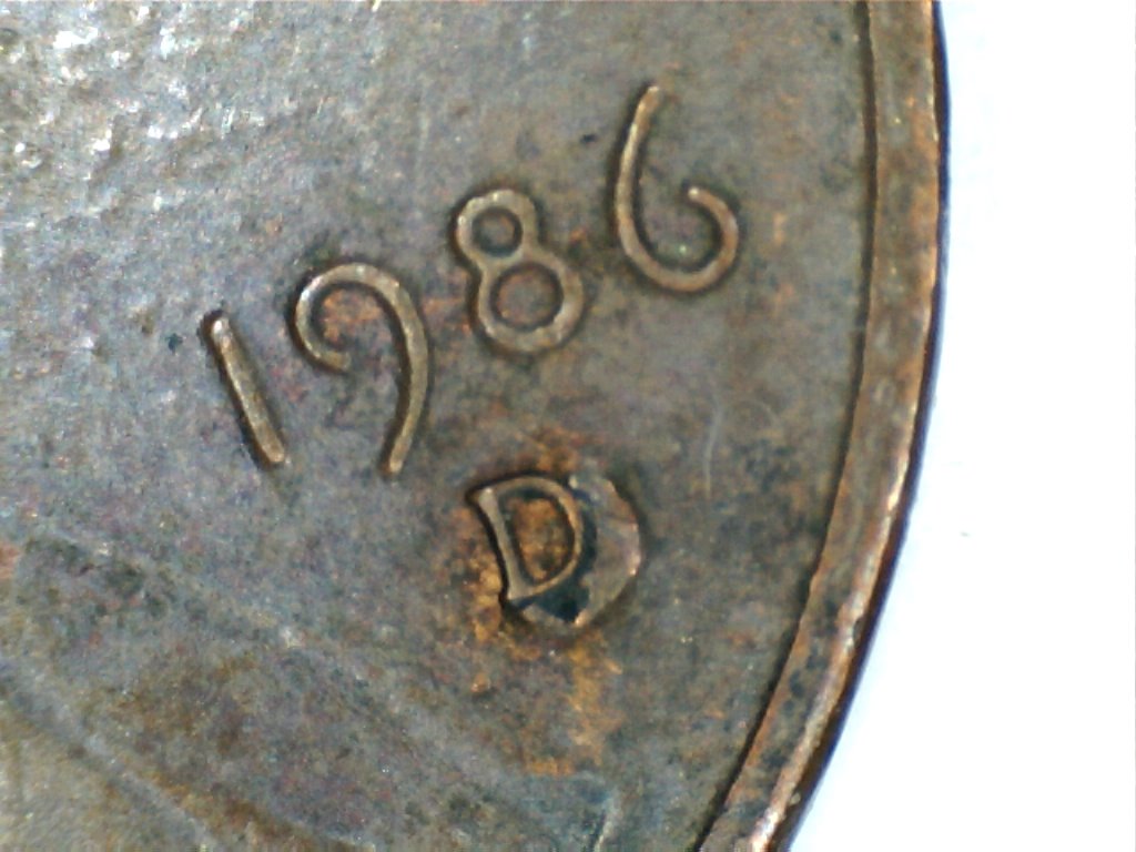 1986-LMC-Die-Chip-Or-Gas-Bubble?