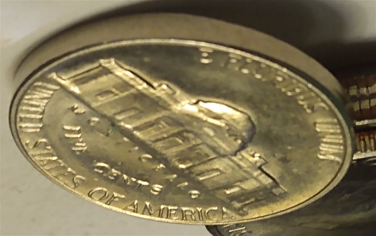 1969-D-Nickel.-It's-Swelled-On-Both-Sides-Missing-Stairs-And-Other-Things