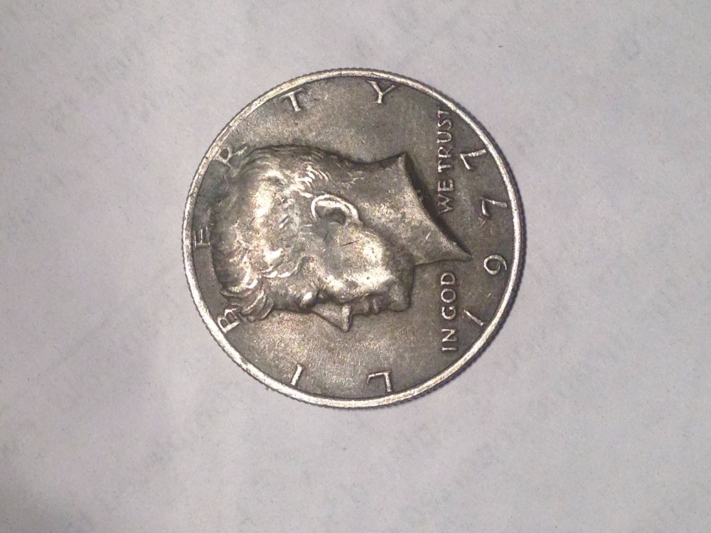 Kennedy-Half-Dollar-With-Oversized-Head-Overlapping-Letters