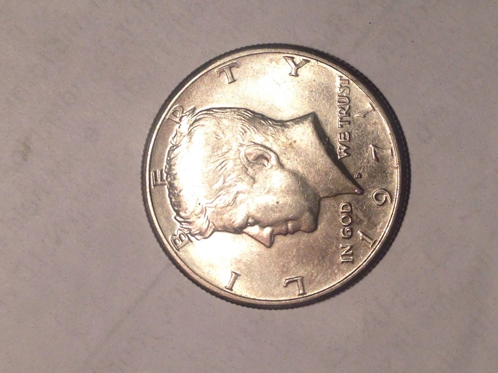 Kennedy-Half-Dollar-With-Oversized-Head-Overlapping-Letters