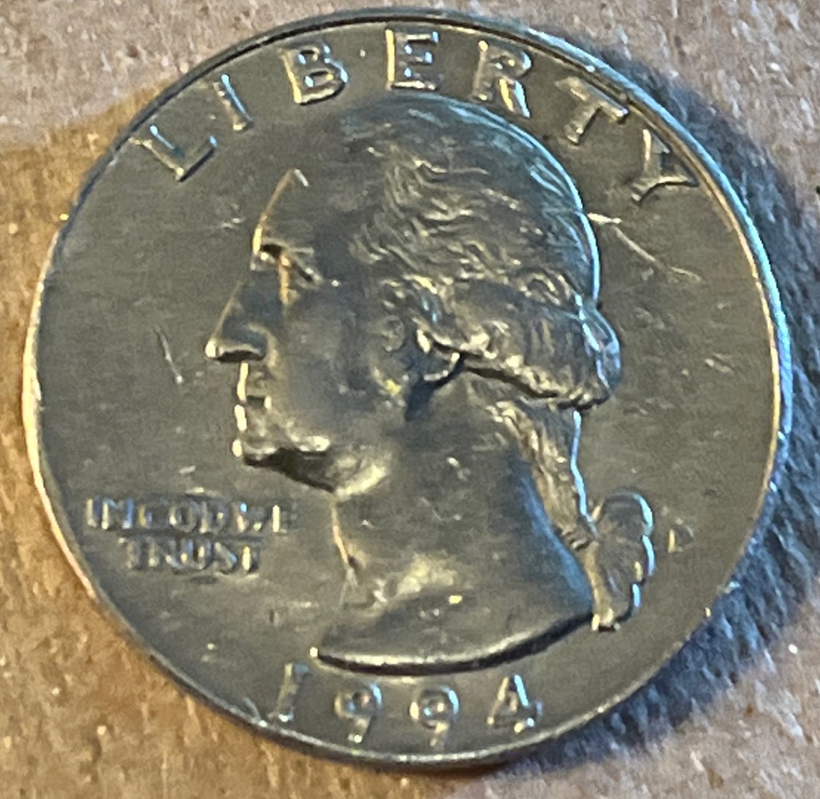 1994-P-Quarter-That-Weighs-5.2-Grams-And-Has-A-23.1-Diameter