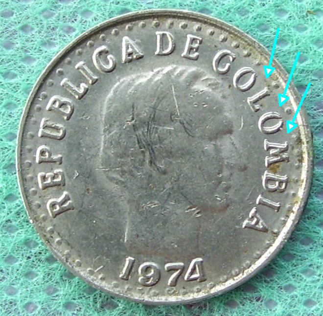 DD-Or-MD-In-A-10-Centavos-Colombian-Coin-1974-?