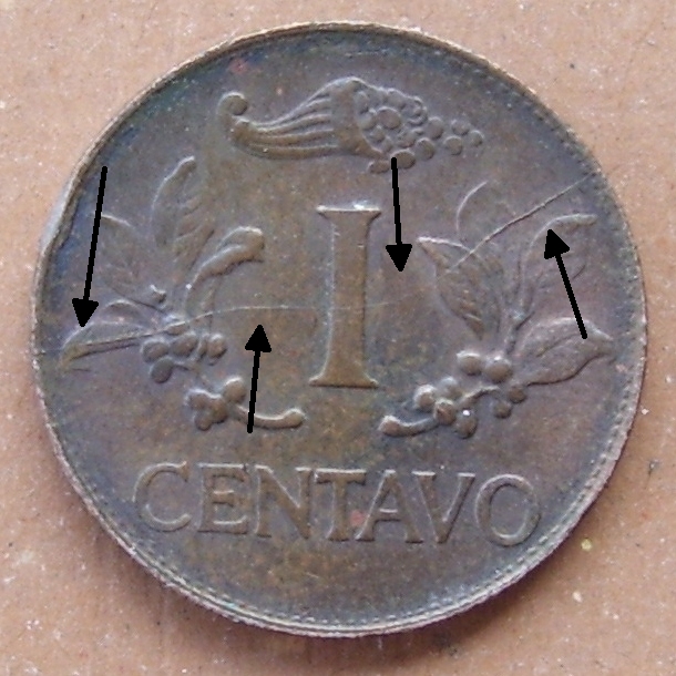 One--Centavo-1960-Colombian-With-Long-Die-Crack-And.....